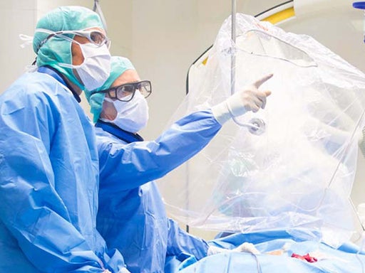 Interventional cardiologists working in the catheter lab​